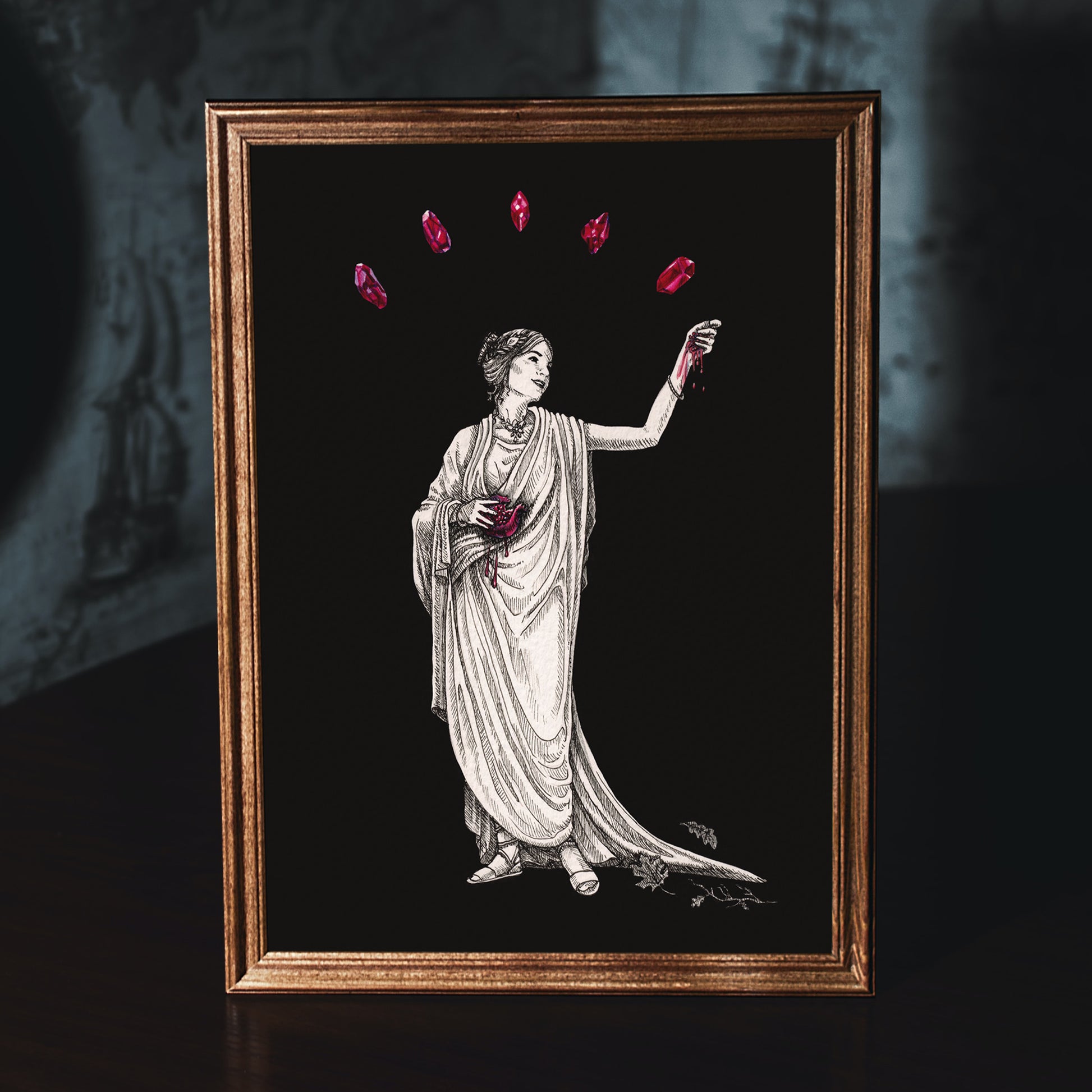 Persephone goddess of Spring from ancient Greek mythology holding the pomegranate seeds that Hades god of the underworld gave to her and surrounded by symbolic red garnet gems, handmade art print by Kimro Studio